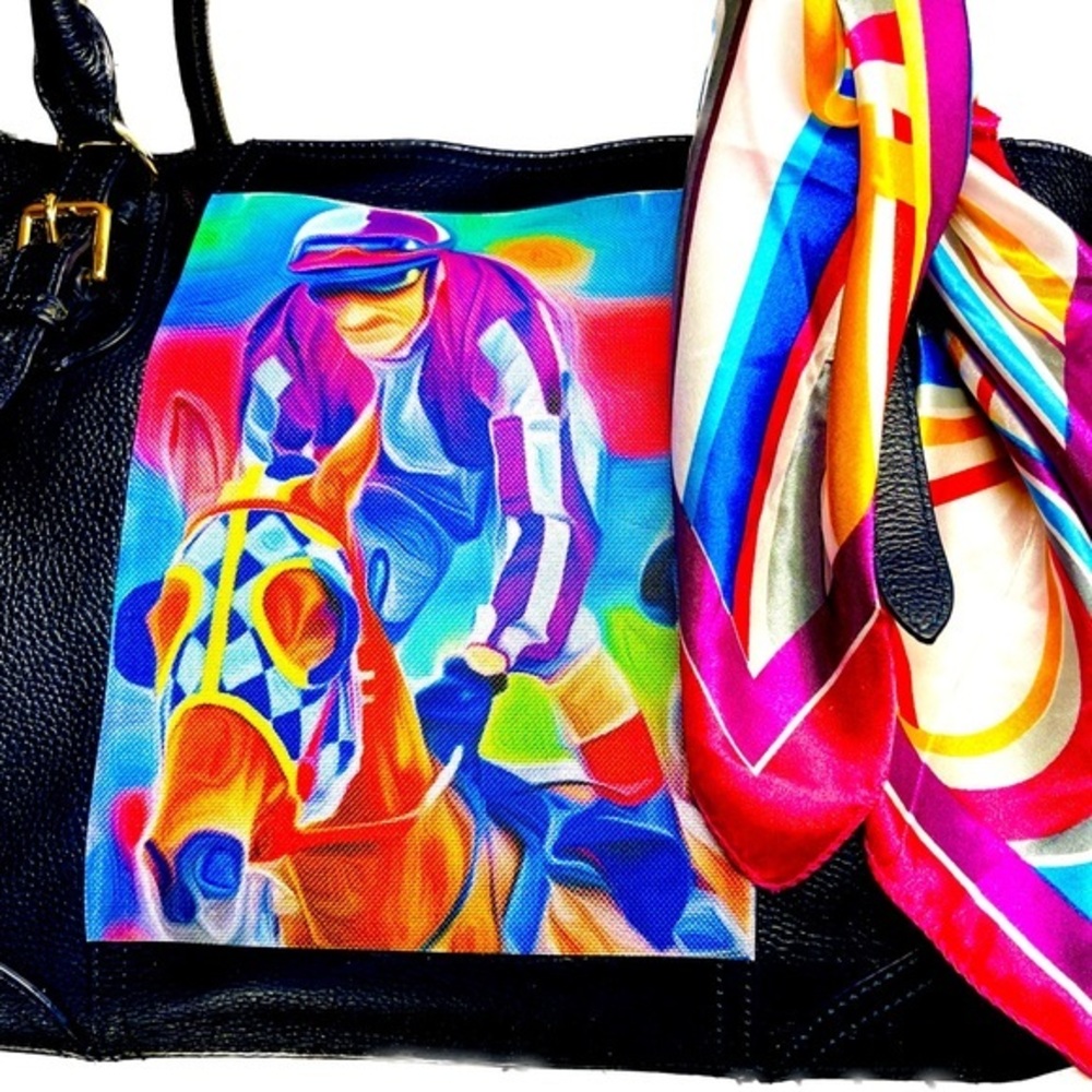 Leather in navy with no wear and a jockey motif on canvas applied to the side.